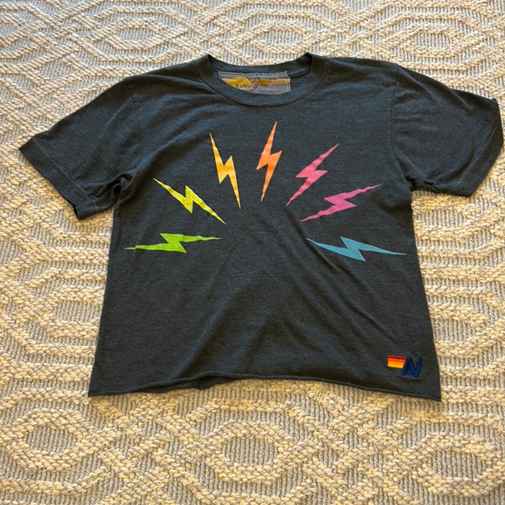 EUC black Aviator Nation t-shirt with colorful lighting bolts on it